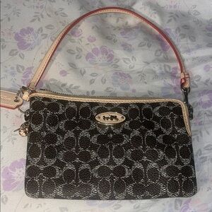 Coach Black and Tan Monogram Clutch with Gold Hardware